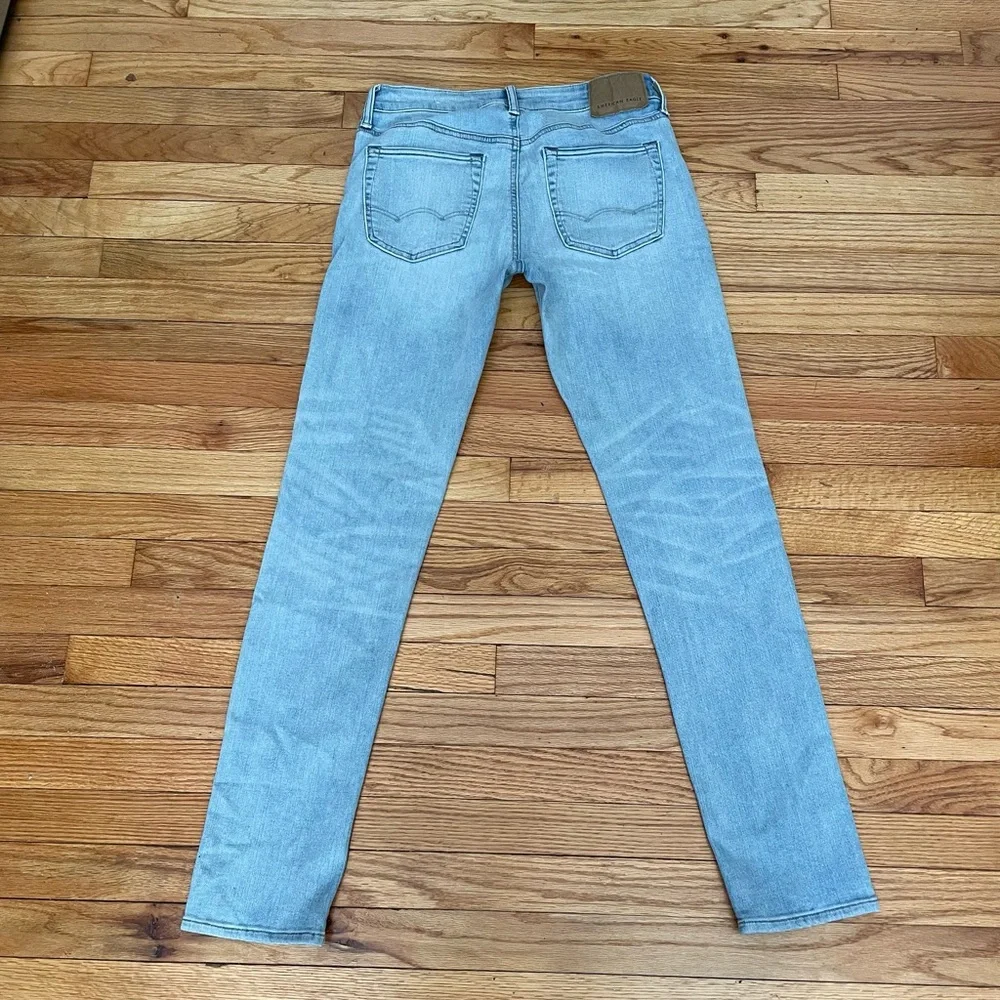 American Eagle Next Level Flex Slim Wash/Distressed Faded Stone Light Blue 20x34